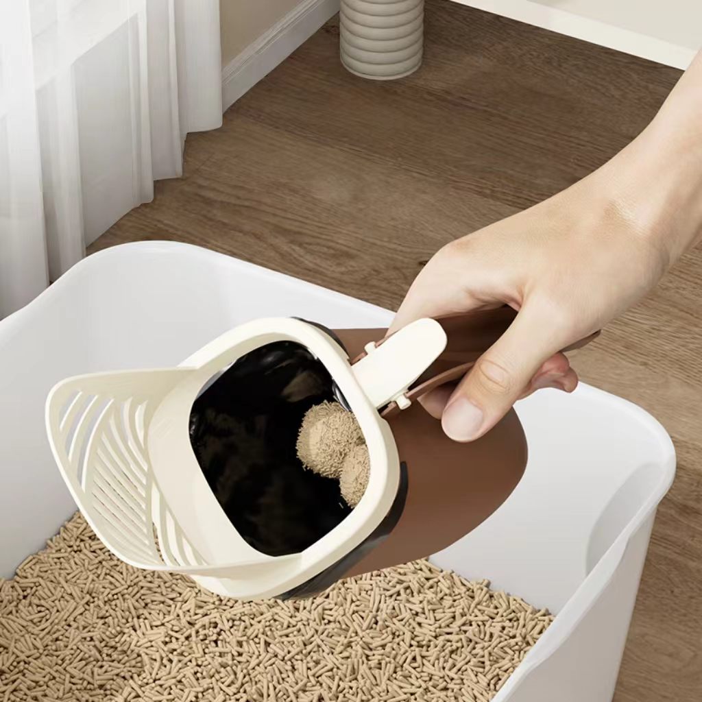 Integrated cat litter scoop with a built-in trash bin – a two-in-one, large-capacity cat waste cleaning tool for pet cats.